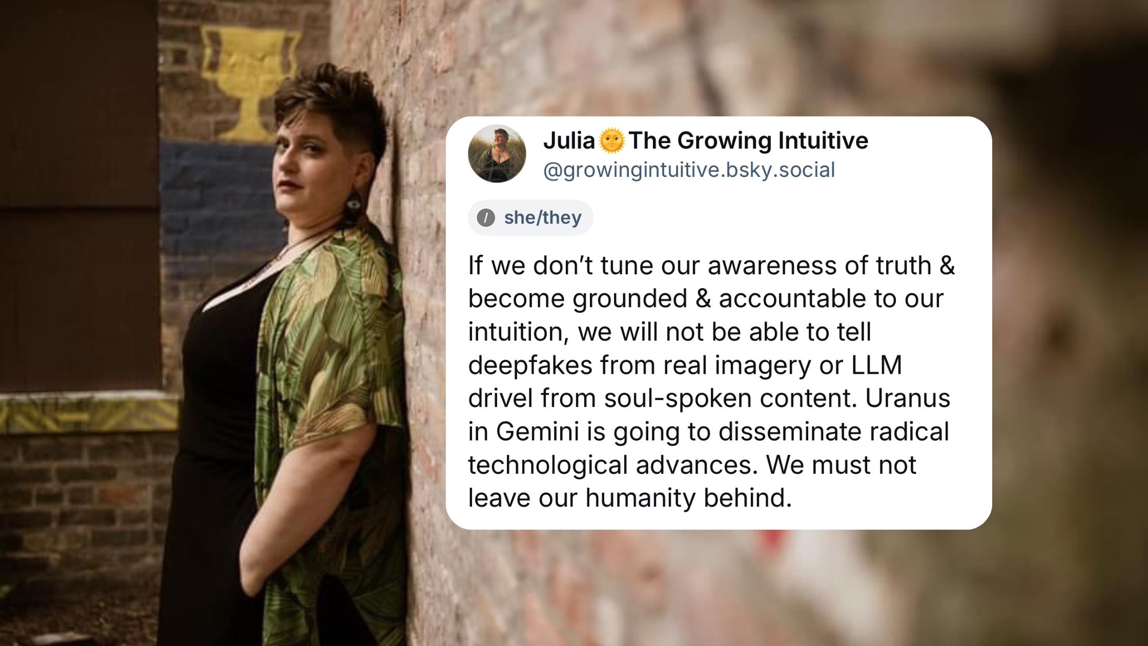 Leaning against a brick wall, face turned towards the camera. BlueSky quote shown speaks about Uranus in Gemini challenging us to not leave our humanity behind as tech advances proliferate.